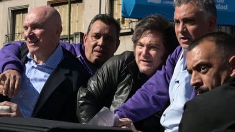 Protesters hurl rocks at Argentinian president Javier Milei during campaign rally amid corruption allegations