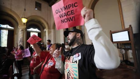 Businesses seek to overturn hotel and airport wage hikes by forcing a citywide election