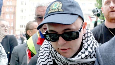 Kneecap rapper greeted by hundreds of supporters at terror charge court hearing