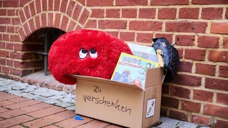 Zum Mitnehmen: Verschenk-Boxen auf Gehweg: Städte reagieren unterschiedlich