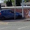 Instant karma for 'road rage' driver who tried to mow down fleeing pedestrian