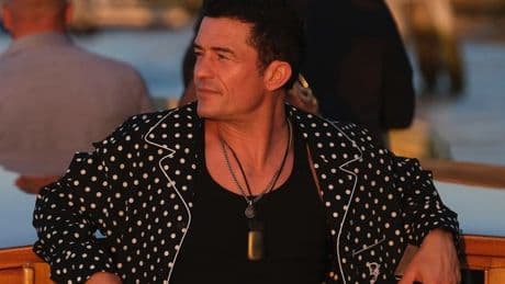 Orlando Bloom embraces the bachelor lifestyle as he dons pyjamas for Jeff Bezos wedding