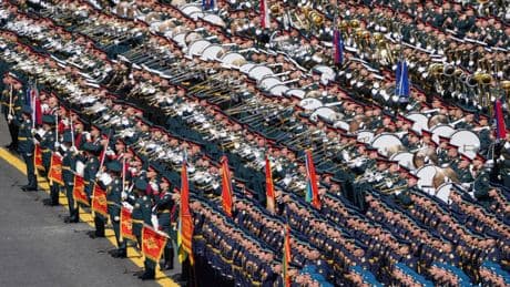 Putin hosts massive Victory Day parade with thousands of troops as threat of Ukrainian strike looms despite ceasefire