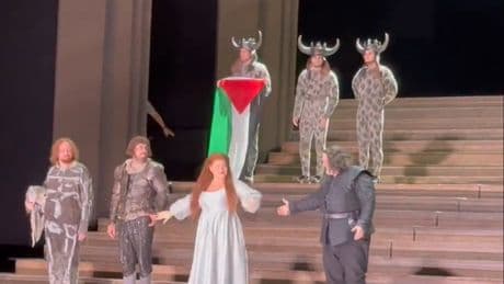 Scuffle breaks out on stage of Royal Opera House after performer unfurls Palestinian flag