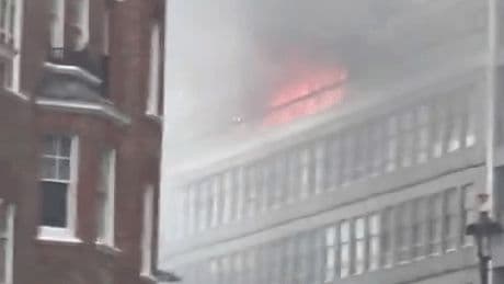 Huge fire rips through London tower block with flats engulfed in flames as 75 firefighters scrambled