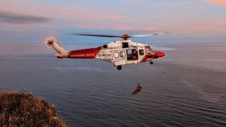 Woman blown out to sea still clinging to inflatable crocodile off Scottish coast
