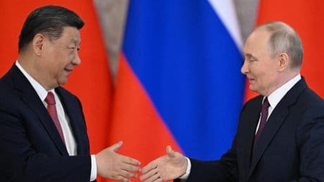 Putin and Xi vow to protect shared version of 'historical truth' in Kremlin talks