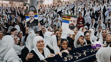 Amid Sectarian Violence in a Syrian City, Even the Funerals Are Armed