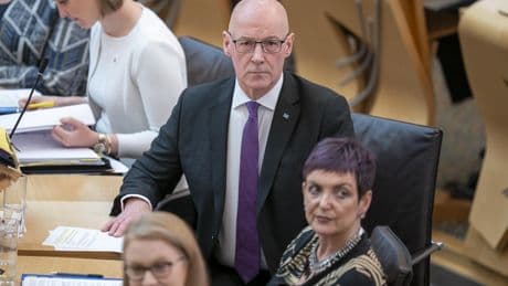 Swinney defends Gray Japan trip as opposition quiz FM on record cancer delays
