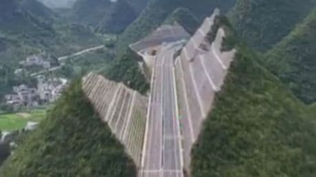 Engineers carve mountain in half to make way for world’s tallest bridge