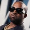 Assistant who accused Kanye West of sexual assault 'in hiding', lawyer says