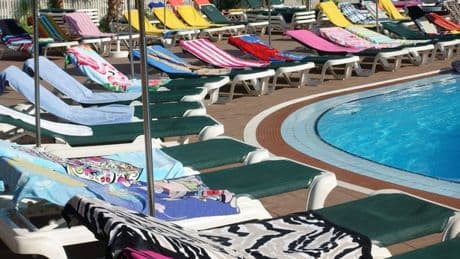 Holidaymakers branded 'mad' as they race to secure sunbed at Spanish hotel