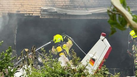 Two killed after small plane crashes into German house