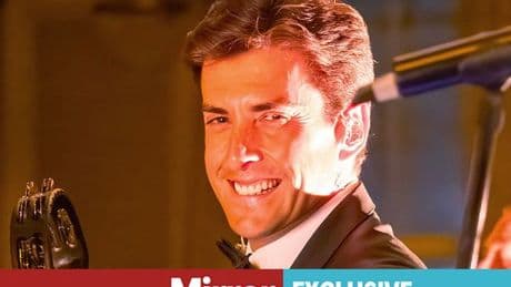 James Argent sings and poses with fans on return to stage days after assault arrest