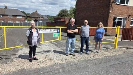 Fuming neighbours blocked from own homes after shopkeeper installs barrier