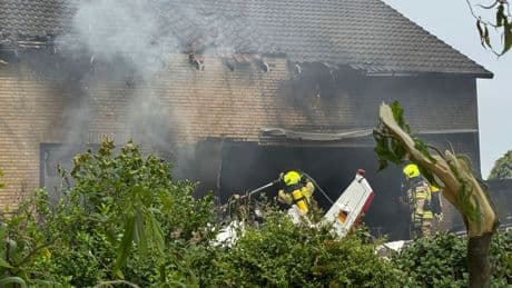 Plane crashes into house, killing two people