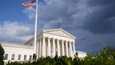 Trump asks justices to OK broad presidential powers on immigration