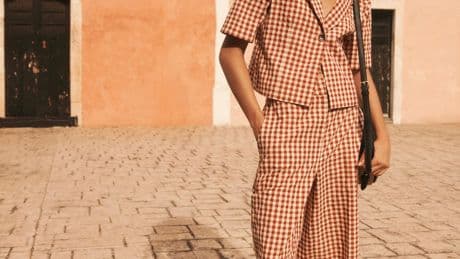 Next says warm Spring sunshine brought out the shoppers as sales surge more than expected