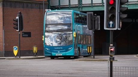 Boy falls from top deck of double decker bus and is left with 'significant injuries'