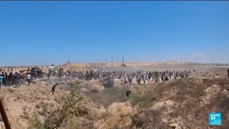 Health officials say Israeli fire kills at least 27 near Gaza aid point