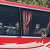Syrian government and Kurdish-led force exchange prisoners in a step toward easing tensions