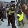 Britain's shameless fare dodgers revealed: Moment brazen commuters attack police, barge through barriers and insult train staff in bid to avoid paying for tickets
