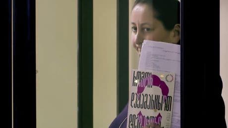 Georgian journalist is convicted of slapping a police office at a protest and gets 2 years in prison