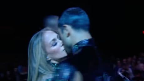 Jennifer Lopez draws criticism for kissing multiple backup dancers during AMA performance