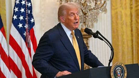 States with strict AI laws could see federal dollars withheld under Trump's new AI plan
