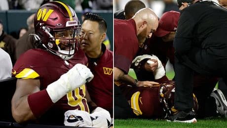 Commanders star Deatrich Wise looks inconsolable after suffering gruesome injury against the Packers