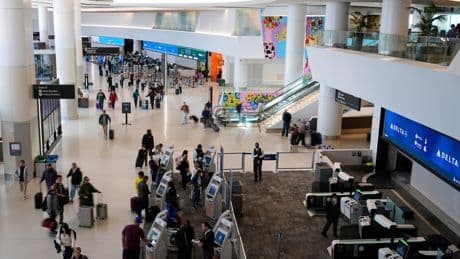 Vaccine researcher with green card held at San Francisco airport for a week and faces deportation