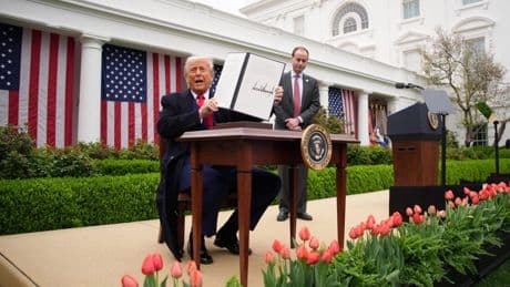 Trump tariffs to remain in place while White House appeals ruling