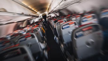 Plane passenger sparks emergency landing after convincing himself SNAKES were slithering on easyJet flight from Gatwick