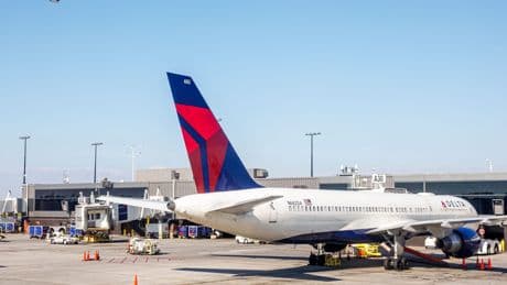 Delta warns of continued disruption at Atlanta airport after severe storms cause canceled flights and the evacuation of an air traffic control tower