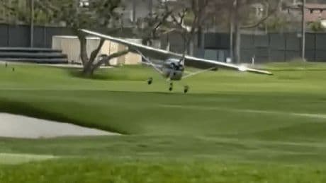 Terrifying moment plane crashes at iconic Riviera Country Club in shock emergency landing as golfers left stunned