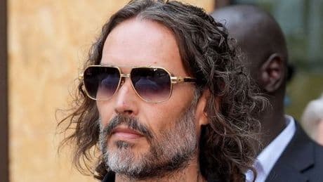 Russell Brand's courtroom sketch revealed as he faces sexual assault charges