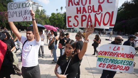 Mexico's president calls march against mass tourism 'xenophobic.' Critics blame government failures