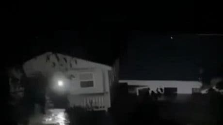Moment entire cabin full of people swept downriver in Texas flooding