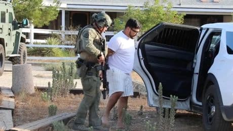 Emmanuel Haro’s father, clad in prison jumpsuit, seen helping police search for baby’s body in California badlands