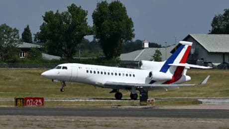 Macron arrives in UK promising co-operation on issues including migration