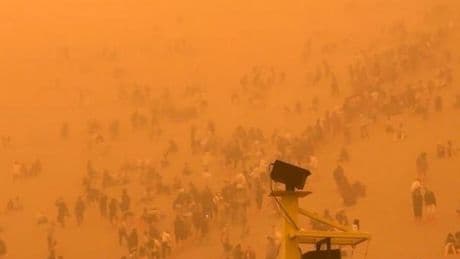Terrifying moment apocalyptic SANDSTORM engulfs 10,000 tourists leaving air thick with orange dust sparking evacuations