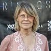 Actress best known for her work alongside Arnold Schwarzenegger looks unrecognizable... can you guess who?