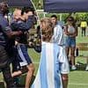 Shocking moment crazed fan runs at Lionel Messi and Luis Suarez before he gets dragged away by security