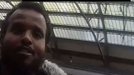 Chilling moment creep tries to snatch teenager from busy train station