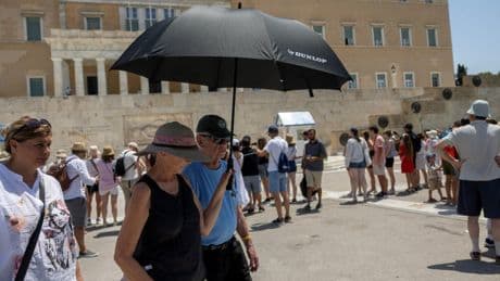 Greece shuts Acropolis and tells outdoor workers to down tools as country scorches in extreme heatwave