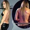 The bumster is back! Jennifer Lopez displays her bottom cleavage in daring jumpsuit while hosting the AMAs