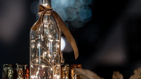 Five ways to upcycle your empty booze bottles into something new