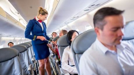 Flight attendant shares what to do if passenger next to you is taking up your space