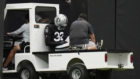 Raiders safety Lonnie Johnson Jr. breaks leg in collision with Maxx Crosby