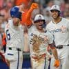 Altuve and Walker each hit a 2-run homer to help the Astros beat the Tigers 8-5